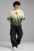 Front studio model wearing cream-to-olive ASCENDRY Survey Corps oversized tee