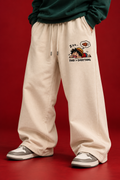 Cream anime embroidered sweatpants front