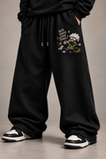 Black anime embroidered sweatpants front studio shot